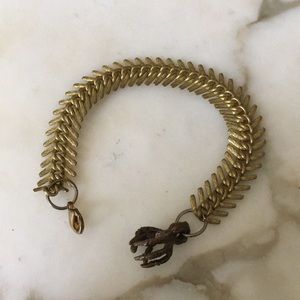 Brass mixed metal bracelet w/hanging talon charm